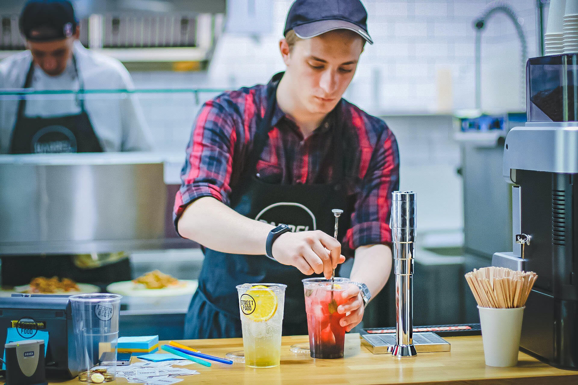 Man holding drinking glass.